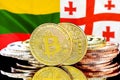 Bitcoins on Lithuania and Georgia flag background