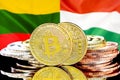 Bitcoins on Lithuania and Hungary flag background