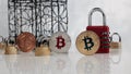 Bitcoins near padlocks Royalty Free Stock Photo