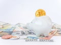 Bitcoins, New Virtual Money concept in piggy bank. Gold bitcoins