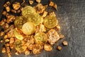 Bitcoins and pieces of gold closeup. Bitcoin against gold, what is the more attractive asset