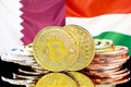 Bitcoins on Qatar and Hungary flag background