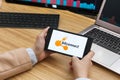 Bitconnect Cryptocurrency Exchange Market. Female Trader Hands Holding the Smartphone Using Application. Crypto Background Concept