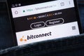 Bitconnect website displayed on smartphone hidden in jeans pocket