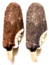 Bite ice cream covered by brown chocolate on white background