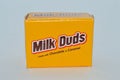 Bite size servings of chocolate Milk Duds in a yellow package Royalty Free Stock Photo