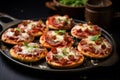 Bite-sized Pan mini pizzas. Generate Ai Royalty Free Stock Photo