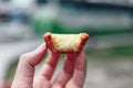 Bited egg tarts in hand in Kuala Lumnpur, Malaysia