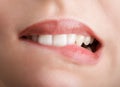 Biting her red lips teeth Royalty Free Stock Photo