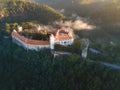 Bitov Medieval castle in South Moravia region during amazing sunrise, Czech republic, Europe. Aerial drone view. Summer or autumn Royalty Free Stock Photo