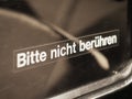 Bitte nicht beruehren (translation: Please do not touch) label