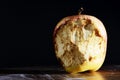 Bitten apple on a dark background