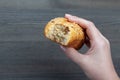 Bitten bread in a female hand