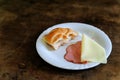 Bitten Bun with ham and cheese Royalty Free Stock Photo