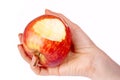 Bitten red apple in hand Royalty Free Stock Photo