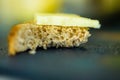 Bitten rye bread and cheese sandwich closeup view Royalty Free Stock Photo
