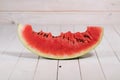 Bitten slice of watermelon on a white background Royalty Free Stock Photo