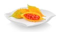 Ripe bittermelon in plate on white background Royalty Free Stock Photo