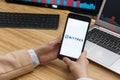 Bittrex Cryptocurrency Exchange Market. Female Trader Hands Holding the Smartphone Using Application. Crypto Background Concept,