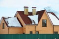 Bitumen asphalt shingles roof. Two chimneys on the roof of the house individual heating. Royalty Free Stock Photo