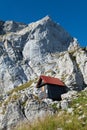 Bivouac shelter under mountain peak in Julian Alps Royalty Free Stock Photo