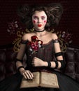 Gothic girl with a clown make up Royalty Free Stock Photo