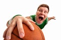 Bizarre basketball player shooting ball to basket Royalty Free Stock Photo