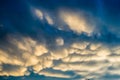 Bizarre fluffy clouds at sunset