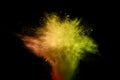 Abstract color powder explosion on black background.abstract Freeze motion of color dust particles splash. Royalty Free Stock Photo