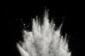 Bizarre forms of of white powder explosion cloud against dark background Royalty Free Stock Photo