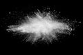 Bizarre forms of white powder explosion cloud against dark background. Royalty Free Stock Photo