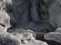 Waterfalls Todtnauer WasserfÃÂ¤lle in winter with water spray, frozen rocks and icicles on sunny winter day in Black Forest. Royalty Free Stock Photo