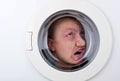 Bizarre man inside washing machine Royalty Free Stock Photo