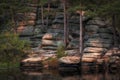 bizarre rocks on shore of the mystical Devil Lake Shaitankol in Karkaraly National Park in Kazakhstan