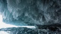 Bizarre stalactite icicles hang from the base of the rock