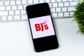 BJ`s Wholesale Club app logo on a smartphone screen.