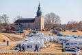 Bjurum church with motorhomes and caravans by lake HornborgarsjÃÂ¶n in Sweden