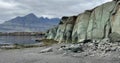 Blabjorg, also known as Green Rock, in Eastern Iceland, known for its pebble beach and scenic viewsn the coast