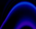 black abstract background with fading blue glowing lines.