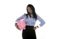 Black African American business woman holding huge pink piggybank