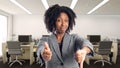 Undecided African American Businesswoman In an Office Royalty Free Stock Photo