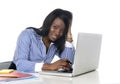 Black african american ethnicity woman working at computer laptop at office desk smiling happy Royalty Free Stock Photo