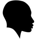 Black African American female, African woman profile picture. Girl from the side without hair with a shaved head, a bald head with Royalty Free Stock Photo