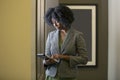 Black African American Female Businesswoman with a Tablet