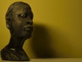 Black African Art, wooden sculture of An beautiful intriging afrikan woman Royalty Free Stock Photo