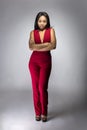 Black Fashion Model with Red Pantsuit Royalty Free Stock Photo