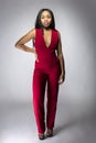 Black Fashion Model with Red Pantsuit Royalty Free Stock Photo