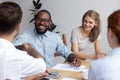 Black african investor meets with company members shaking hands Royalty Free Stock Photo