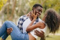 Black african man and women couple lover teen lifestyle living together at park outsoors