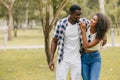 Black african man and women couple lover teen lifestyle living together at park outsoors